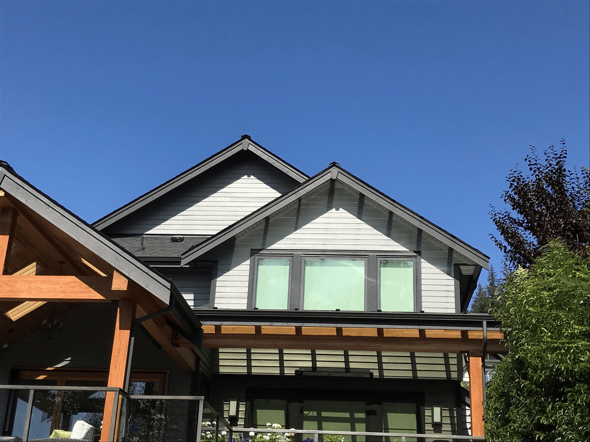 Another project was done for My House Design/Build/Team. After they finished the awesome home renovation in Coquitlam, the vinyl siding above the glass roof needed to be changed for Hardie planks, so it will not be affected by sun reflection from the glass roof belove. The biggest challenge was the access and handling over the glass roof. But nothing we cannot manage. The result? You do not see any difference between the original siding and the new one.
