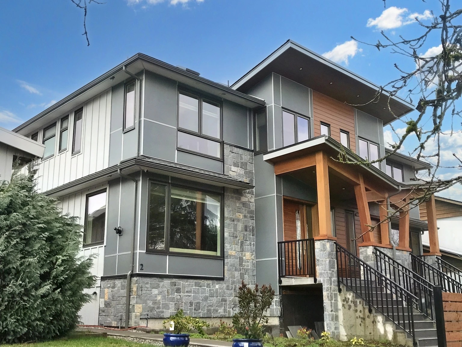 Brand new construction managed and done by Panthers Creative. This duplex also has a garage with two spaces. We have installed Siga Majvest as a weather barrier. Hardie Board and Batten, Hardie panels with Easy trims and LUX architectural metal siding were installed by us. Also vinyl beaded soffit and LUX Architectural metal soffit over at the entrance porch and roof.