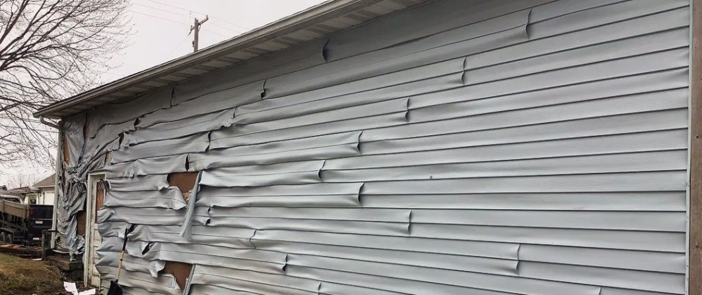 Vinyl siding affected by weather.